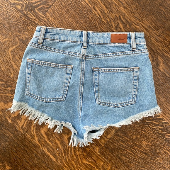 Distressed denim shorts - Picture 3 of 3